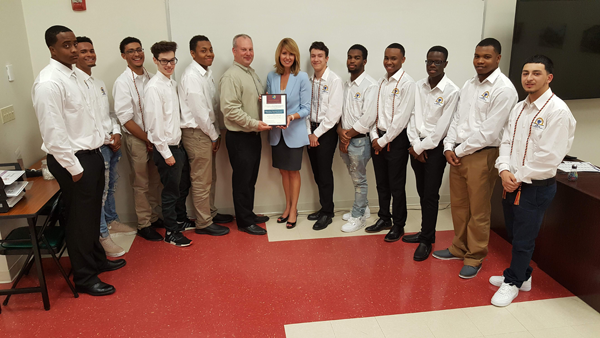 Maryland Department of Labor Secretary Kelly M. Schulz with IEC Chesapeake Executive Director Grant Shmelzer and graduates of the IEC's first Pathways to Success Electrical Pre-Apprenticeship Program.  All pre-apprenticeship graduates have applied to the IEC’s four-year registered apprenticeship program and are expected to be placed in full-time jobs.