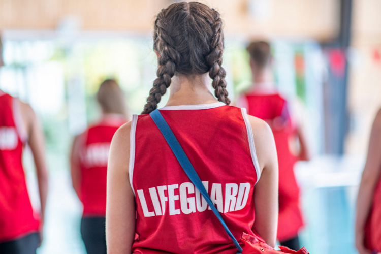 Lifeguards in an indoor pool complex