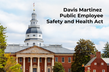 The Maryland State Capitol building and nearby trees and flags. Davis Martinez Public Employee Safety and Health Act