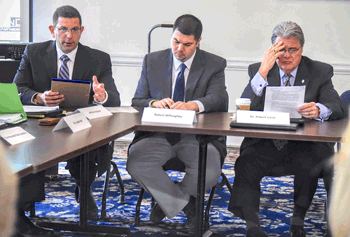 Ross Goldstein, Executive Director of the Maryland Longitudinal Data Center, addresses the Governor's P-20 Council at the February, 2016 meeting in the Governor's Reception Room.  Also in this picture is Robert Willoughby, Chair of the P-20 College and Career Readiness work group, and USM Chancellor Dr. Robert Caret, Chair of the P-20 Workforce Development workgroup